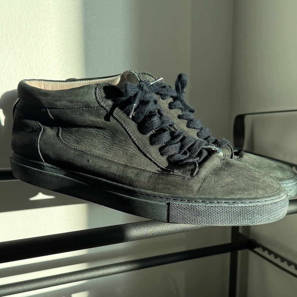 Sleek Black Leather Sneakers for Men